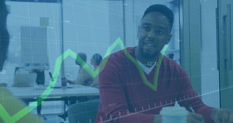 Business professional discussing data trends with colleagues while green financial chart overlaying
