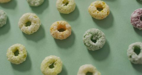 Colorful Round Breakfast Cereals on Blue Background - Download Free Stock Images Pikwizard.com