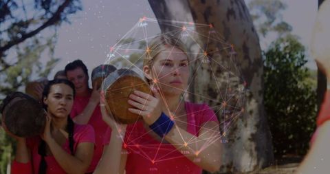 Women Carrying Timber during Outdoor Fitness Challenge with Augmented Reality Overlay