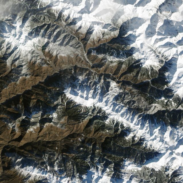 While Sochi is a coastal town on the Black Sea, the skiing events for the XXII Olympic Games are taking place about 40 kilometers (25 miles) inland. The venues are clustered around Krasnaya Polyana, a small town tucked between the Aibiga and Psekhako Ridges in the western Caucasus. This image—acquired by the Advanced Land Imager (ALI) on NASA’s Earth Observing-1 (EO-1) satellite on February 8, 2014—offers a view of the town and the ski facilities.  The Rosa Khutor Alpine Center is the home to the downhill, snowboard, and freestyle events. The combined downhill skiing area measures about 20 kilometers (12 miles) in total, with the men’s downhill course stretching 3,500 meters (11,482 feet) and featuring a 1,075-meter (3,526 foot) change in elevation. The highest lift climbs to the summit of Rosa Peak, which rises 2,320 meters (7,612 feet). While not being used for the Olympics, the nearby Black Pyramid mountain has downhill skiing trails as well.  The same steep slopes that make Rosa Peak good for skiing also elevate the risk of avalanches. To protect against falling snow, planners installed a series of gas pipes along the top of the ridge. The pipes emit bursts of oxygen and propane that create small, controlled avalanches. Event organizers also installed a series of earthen dams to steer snow away from infrastructure, and they have deployed two backhoes to the top of Aibiga Ridge to knock cornices away before they pose a risk.  The Laura Cross-country Ski and Biathalon Center is located to the north on Psekhako Ridge. It includes two stadiums, each with their own start and finish zones, two track systems for skiing and biathlon, as well as shooting areas and warm-up zones. The center is named for the Laura River, a turbulent river that flows nearby.  NASA Earth Observatory image by Jesse Allen and Robert Simmon, using EO-1 ALI data provided courtesy of the NASA EO-1 team. Caption by Adam Voiland.  Instrument: EO-1 - ALI  Read more: <a href="http://earthobservatory.nasa.gov/IOTD/view.php?id=83131&amp;eocn=home&amp;eoci=iotd_grid" rel="nofollow">earthobservatory.nasa.gov/IOTD/view.php?id=83131&amp;eocn...</a>  Credit: <b><a href="http://www.earthobservatory.nasa.gov/" rel="nofollow"> NASA Earth Observatory</a></b>  <b><a href="http://www.nasa.gov/audience/formedia/features/MP_Photo_Guidelines.html" rel="nofollow">NASA image use policy.</a></b>  <b><a href="http://www.nasa.gov/centers/goddard/home/index.html" rel="nofollow">NASA Goddard Space Flight Center</a></b> enables NASA’s mission through four scientific endeavors: Earth Science, Heliophysics, Solar System Exploration, and Astrophysics. Goddard plays a leading role in NASA’s accomplishments by contributing compelling scientific knowledge to advance the Agency’s mission.  <b>Follow us on <a href="http://twitter.com/NASAGoddardPix" rel="nofollow">Twitter</a></b>  <b>Like us on <a href="http://www.facebook.com/pages/Greenbelt-MD/NASA-Goddard/395013845897?ref=tsd" rel="nofollow">Facebook</a></b>  <b>Find us on <a href="http://instagram.com/nasagoddard?vm=grid" rel="nofollow">Instagram</a></b>