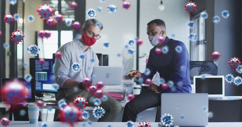 Masked Businessmen Discussing in Office with Floating Virus Cells