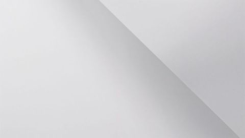 Minimal diagonal paper fold casting soft shadow and creating geometric negative space