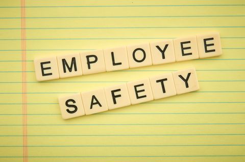 Employee safety scrabble tiles on lined notepad