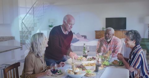 Diverse Seniors Dining and Sharing Joy Indoors - Download Free Stock Images Pikwizard.com