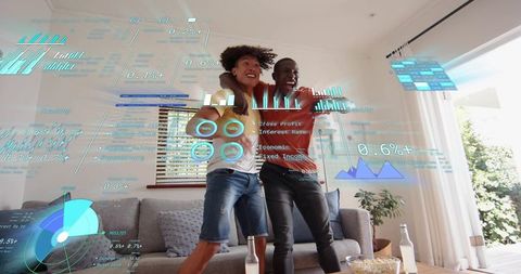 Friends celebrating on living room sofa sharing with augmented reality finance HUD overlay