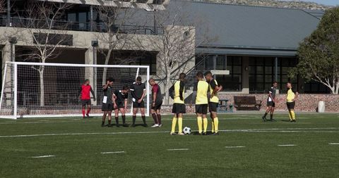 Soccer Players in Action During Intense Practice Awaiting Strategy Game Day