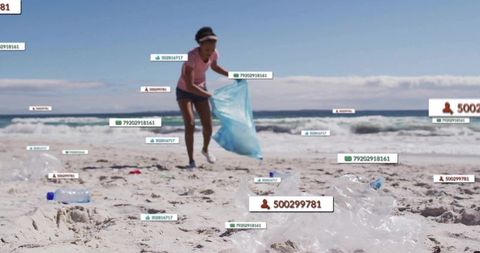 Environmental Activist Collecting Litter on Beach with Digital Counters