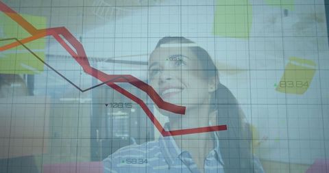Businesswoman Analyzing Data with Strategic Focus in Modern Office