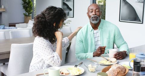 Couple Enjoying Breakfast and Conversation at Home - Download Free Stock Images Pikwizard.com