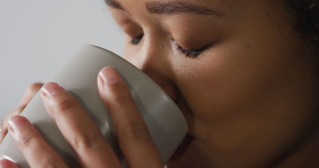 Close-Up Woman Drinking from Cup Relaxing - Download Free Stock Images Pikwizard.com