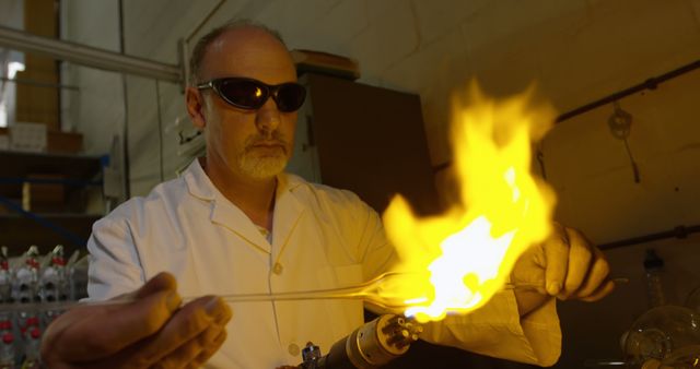 Scientist Conducting Flammable Liquid Experiment in Laboratory - Download Free Stock Images Pikwizard.com