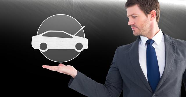 Digital composition of businessman with car repair icon floating in hand against grey background