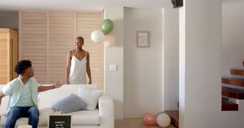 Friends celebrating together at home with joyful atmosphere