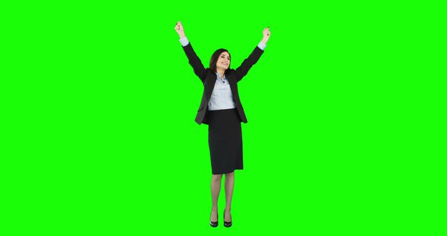 Excited Businesswoman Celebrating with Raised Arms on Green Screen - Download Free Stock Images Pikwizard.com