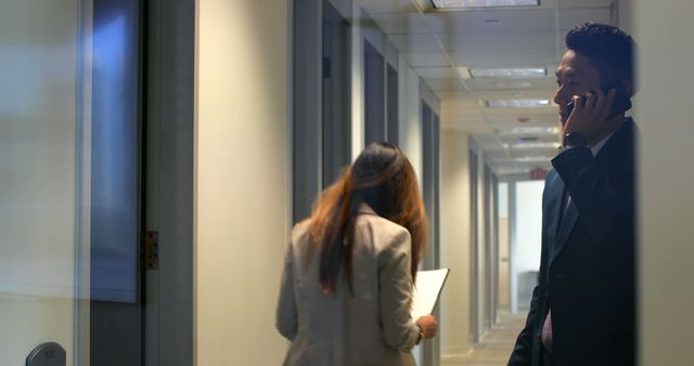 Office Workers Walking and Communicating in Modern Hallway - Download Free Stock Images Pikwizard.com