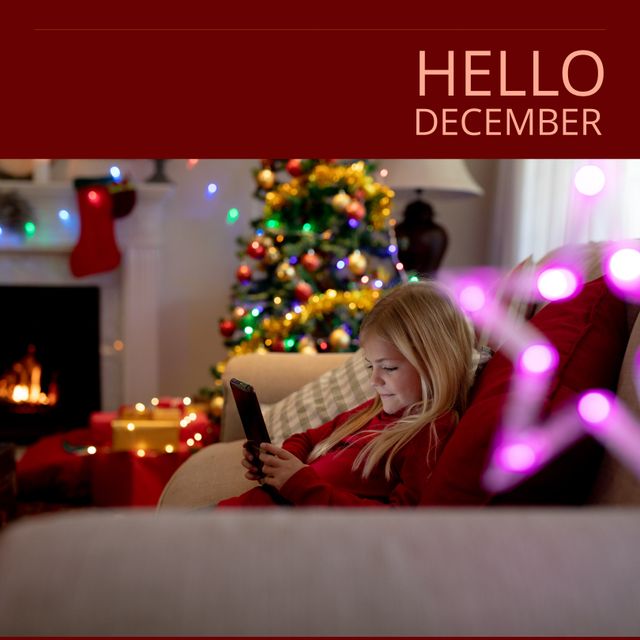 Caucasian Girl Using Smartphone by Christmas Tree with Text 'Hello December' - Download Free Stock Templates Pikwizard.com