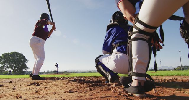 Baseball Batter Preparing to Swing at Pitch in Sunny Outdoor Field - Download Free Stock Images Pikwizard.com