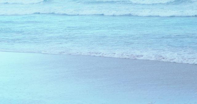 Calm Ocean Waves Gently Rolling onto Sandy Shoreline - Download Free Stock Images Pikwizard.com