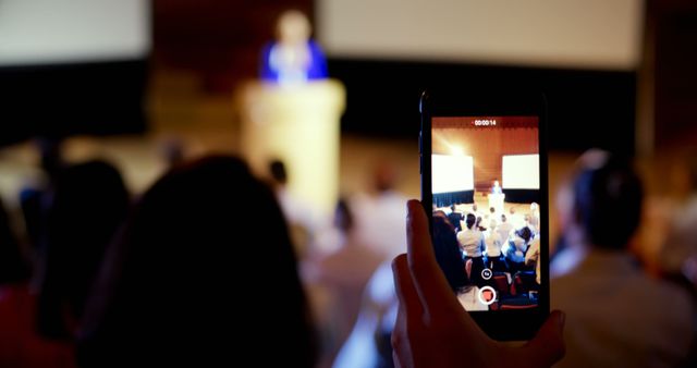 Attendee Filming Speaker During Conference Presentation - Download Free Stock Images Pikwizard.com