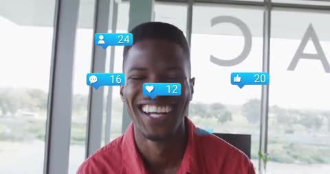 Joyful Man Engaging with Social Media Notifications