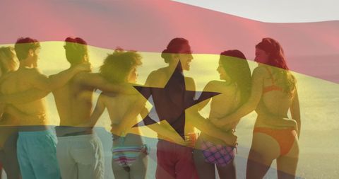 Diverse friends enjoying sunny beach with ghana flag overlay