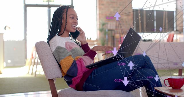 Businesswoman Analyzing Financial Growth Data on Laptop While Talking on Phone - Download Free Stock Images Pikwizard.com