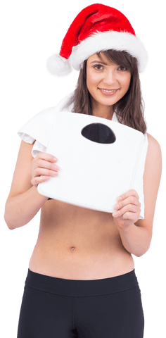 Festive woman with santa hat holding transparent weighing scale