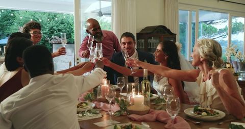 Joyful Family and Friends Celebrating Wedding Reception