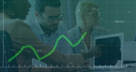 Team Discussing Data with Graph Overlay in Modern Workspace