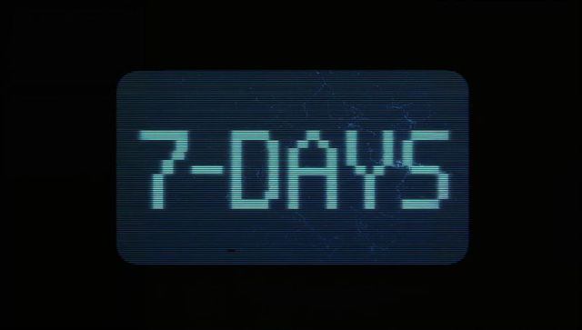 Displaying rounded-rect retro crt countdown reading 7-days with cyan glow and scanlines