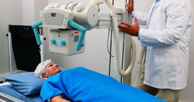 Patient undergoing X-ray examination in medical clinic - Download Free Stock Images Pikwizard.com