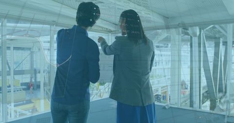 Business Team Analyzing Data with Digital Interface Technology