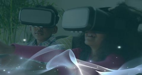 Joyful Children Experiencing Virtual Reality with VR Headsets