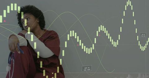 Nurse sitting on break holding stethoscope with financial candlestick data overlay