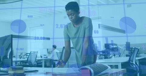 Professional Analyzing Financial Data in Modern Office