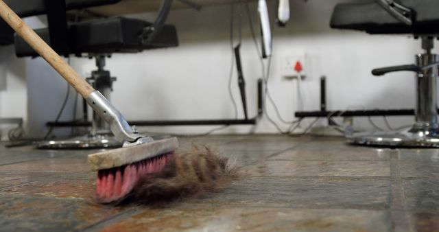 Barber Sweeping Hair from Salon Floor with Broom - Download Free Stock Images Pikwizard.com