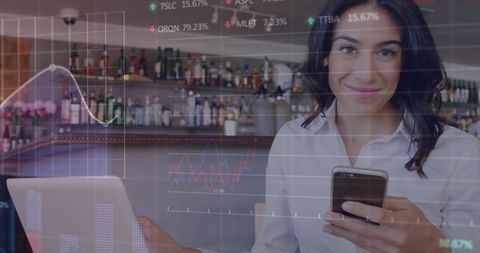Businesswoman analyzing stock market data in busy cafe