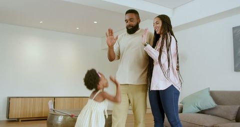 Joyful Family Bonding at Home with Little Daughter