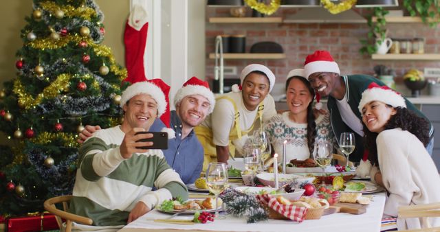 Diverse Friends Celebrating Christmas and Taking a Festive Selfie - Download Free Stock Images Pikwizard.com