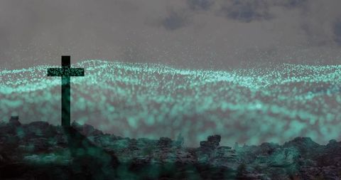 Dark cross silhouette over teal particle field and rocky ridge, ethereal cyan glow surreal