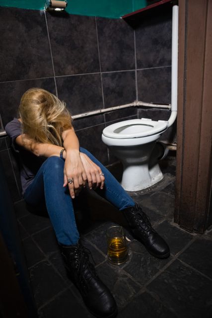 Woman sleeping in the washroom - Download Free Stock Photos Pikwizard.com