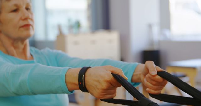 Senior Woman Exercising Using Resistance Bands - Download Free Stock Images Pikwizard.com