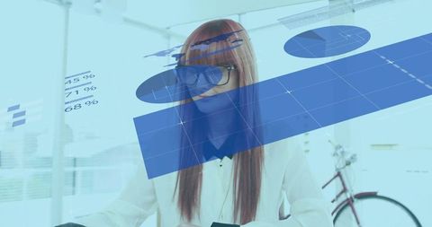 Businesswoman Interacting with Holographic Charts in Futuristic Office