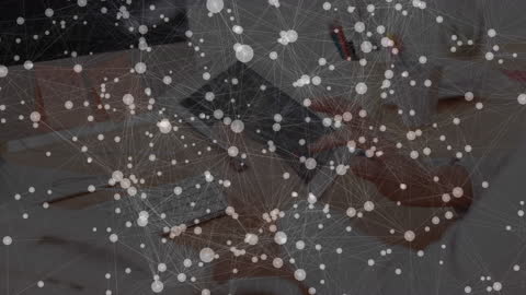 Digital Network Connections Overlaying Tablet Usage