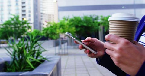 Mobile Lifestyle: Smartphone and Coffee in Urban Setting