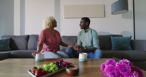Smiling African American Couple Bonding at Home Together