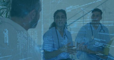 Medical Team Discussing Digital Health Data and Healthcare Technology