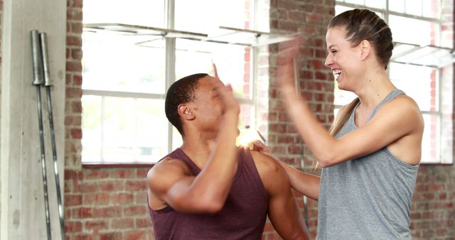 Fitness Partners Celebrating Success with a High Five - Download Free Stock Images Pikwizard.com