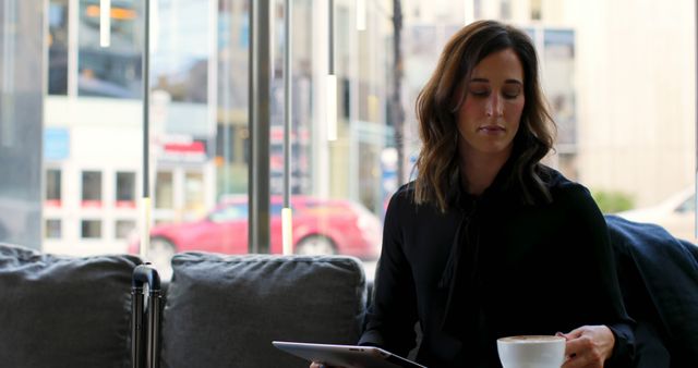 Professional Woman Having Coffee Break in Modern Café - Download Free Stock Images Pikwizard.com