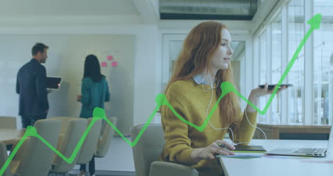 Businesswoman Using Technology with Growth Chart Overlay